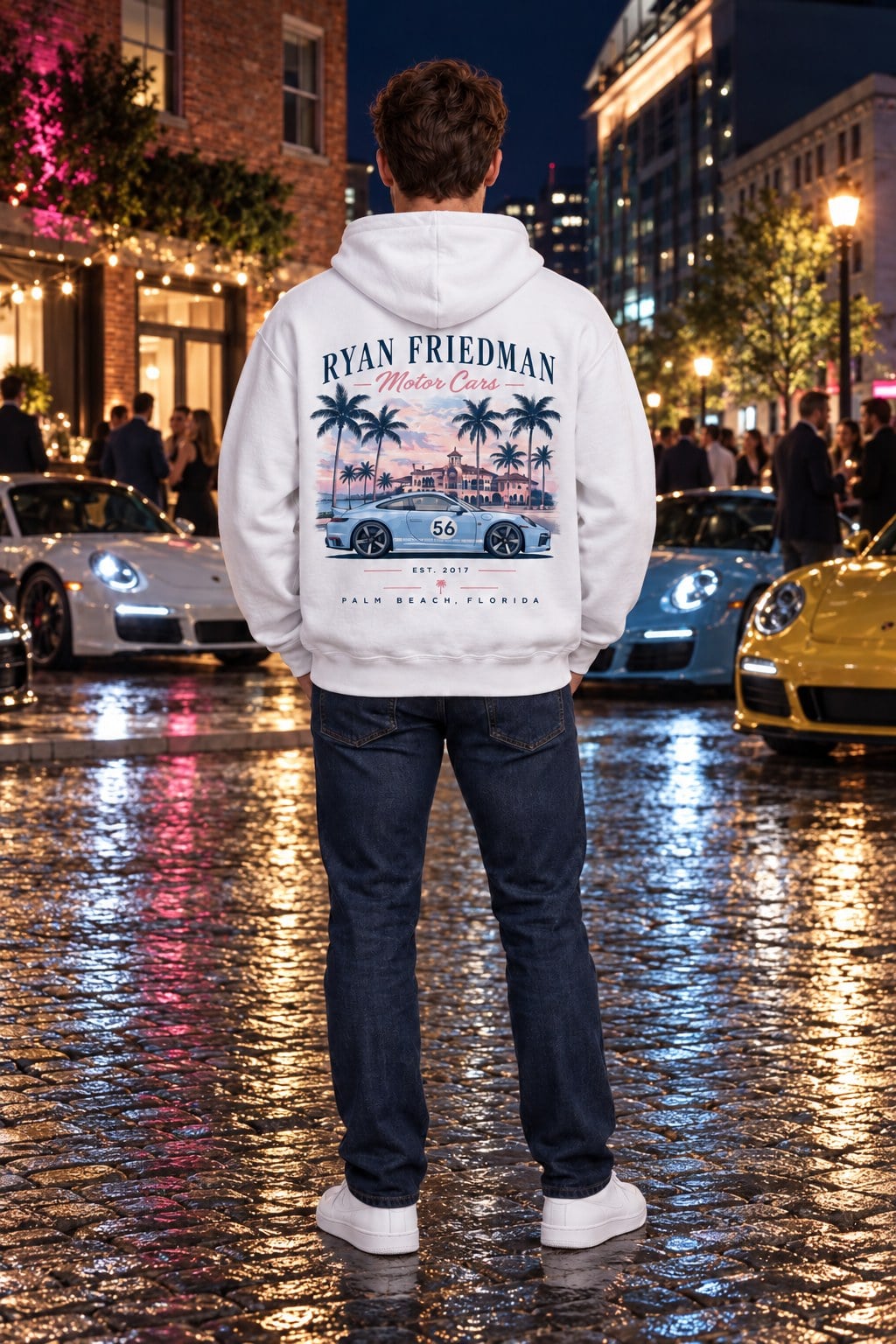 Man wearing the Blue Sport Classic Palm Beach Hoodie from behind, showing the back print