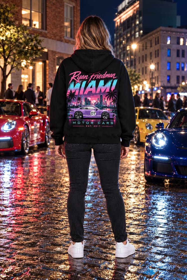 Woman wearing the Miami Nights GT3 Hoodie from behind, showing the back print